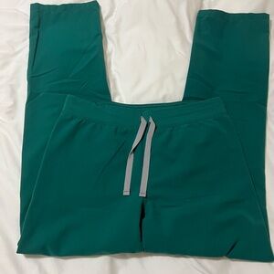 Hunter green Livingston style figs brand pants, size medium tall